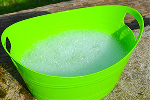 Use a bowl with soapy water: